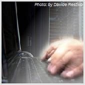 hacker typing on keyboard